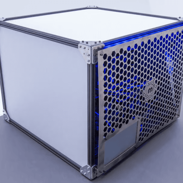Compact computing unit with blue perforated panels — portable high-efficiency solution