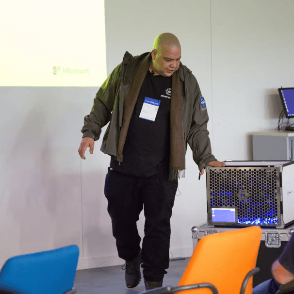 Marcelo Ceccon at a technology event — leadership and hands-on expertise