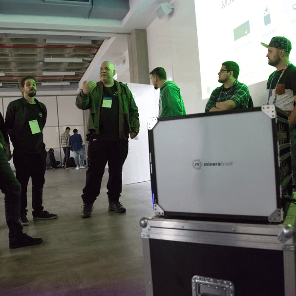 The Vortex team demonstrating hardware products — collaboration and real-world deployment
